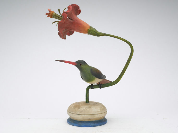 Frank Finney – Hummingbird perched on bent branch of a decorative flower – 2024